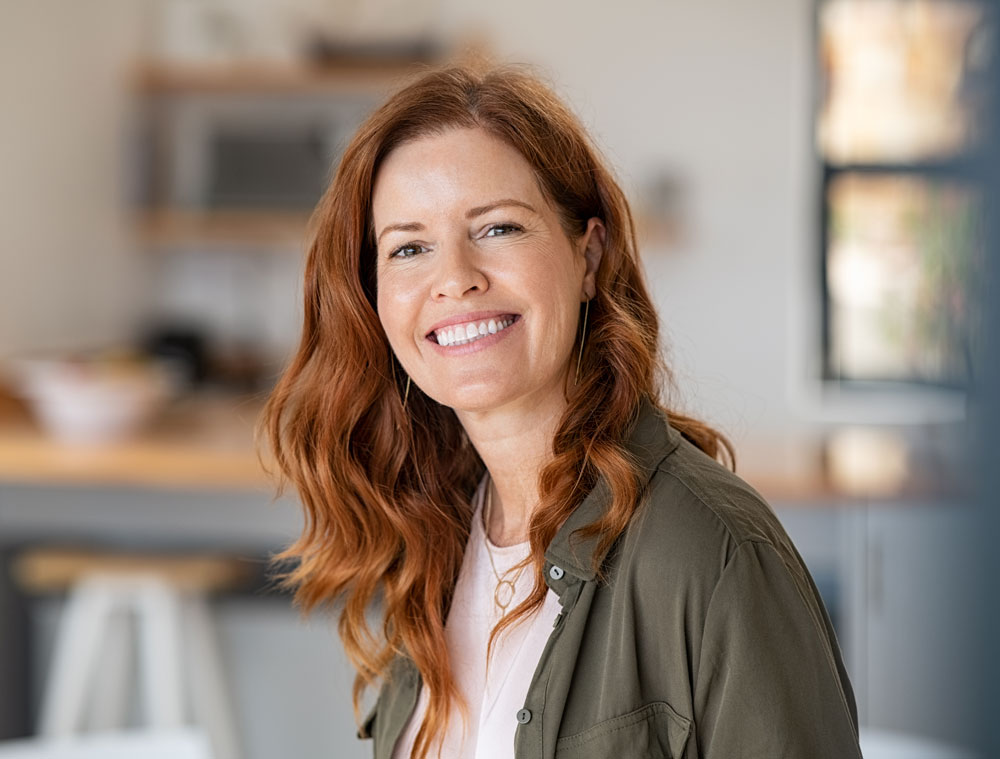 Mature Woman With Red Hair Office